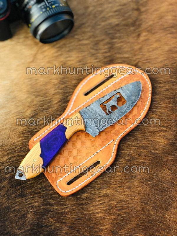 2B241E7F-A2BC-4FE3-B47B-FC4C9CDC52FF Dog Cut Out Blade Custom Made Damascus Steel Skinner Knife With Leather Sheath. - Image 1