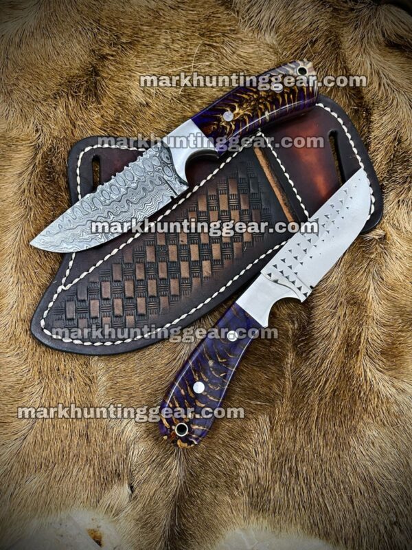 IMG-20231205-WA0011 Custom Handmade Damascus Steel Cowboy Skinner Knife Pair with Beautiful Purple Resin & Pinecone Handles - 3.5" Razor Sharp Blades - Image 1