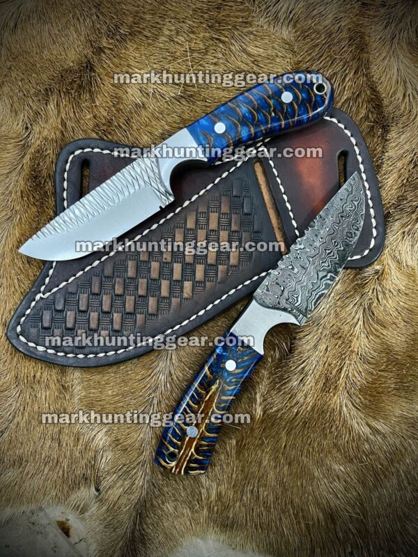 IMG-20231205-WA0012 Custom Handmade Damascus and Resp Steel Cowboy Skinner Knife Pair with Blue Resin & Pinecone Handles | 7.5" Overall Length | Razor Sharp Blades | Free Engraving - Image 1